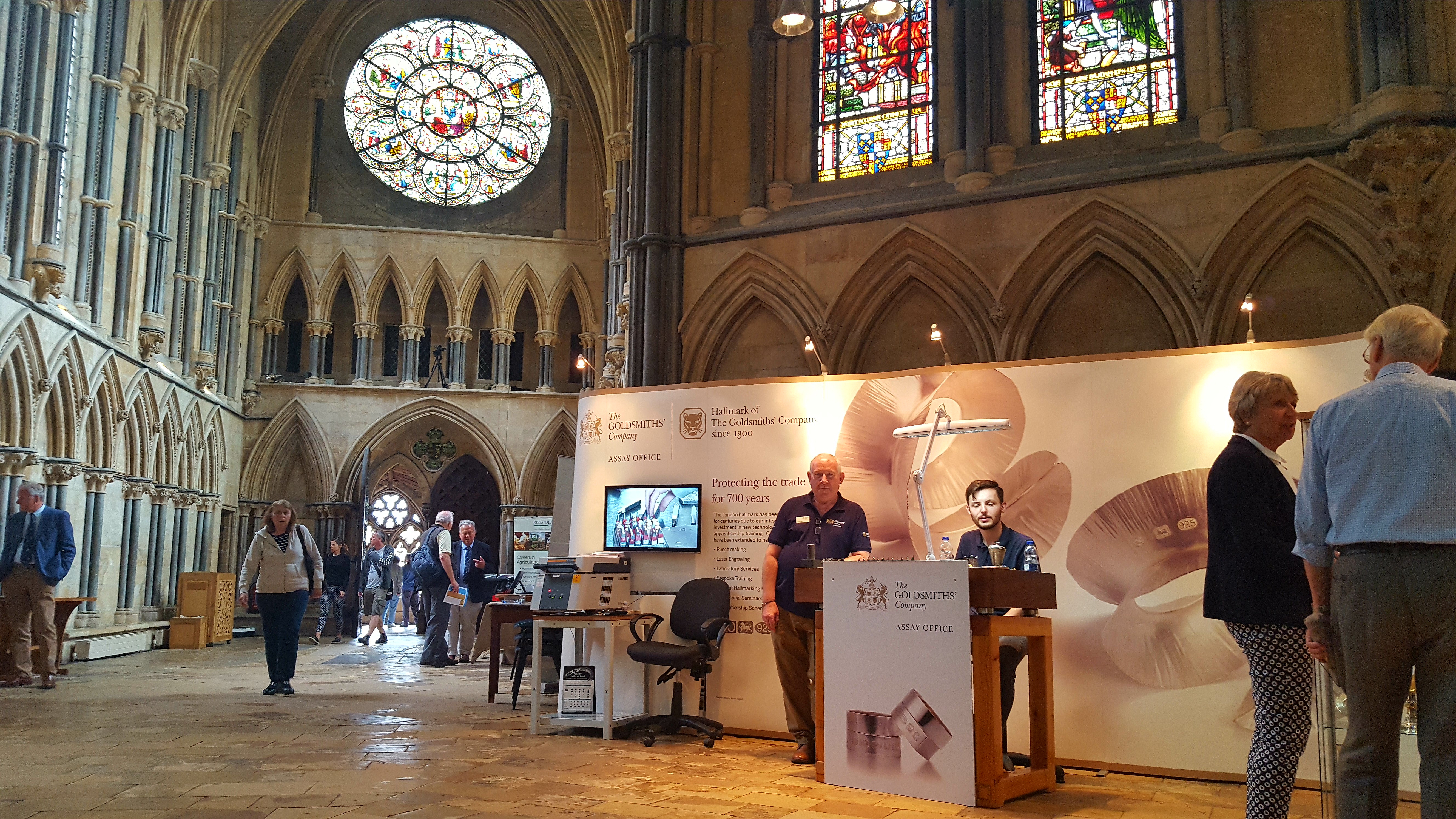 Dave Merry and Ryan Grant demonstrate hallmarking in the Chapter House of the Cathedral