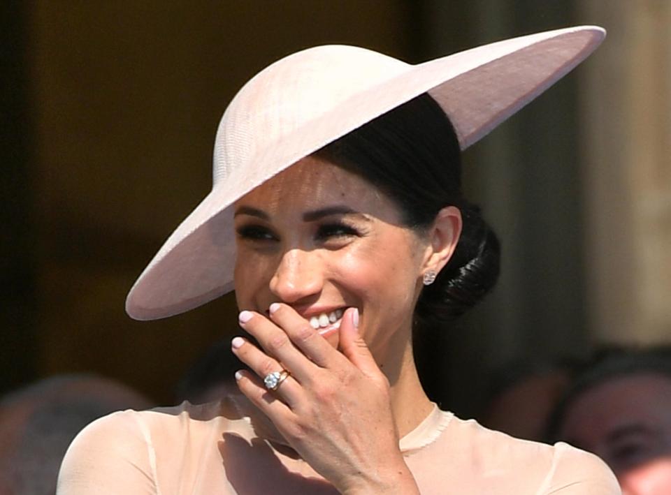 The Duchess of Sussex at Prince Charles' 70th birthday. The solitaire is accompanied by two round diamonds, which belonged to Princess Diana